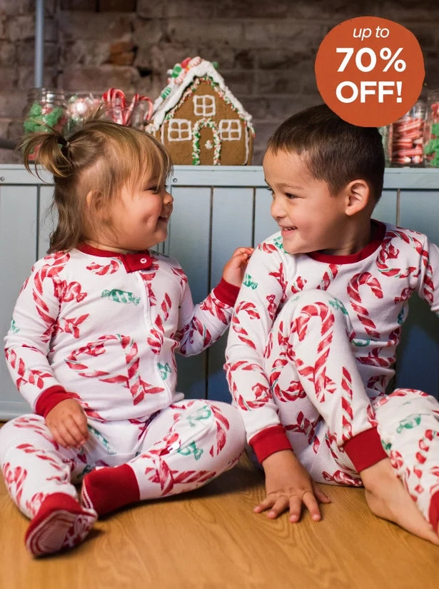 Children wearing Christmas pajamas