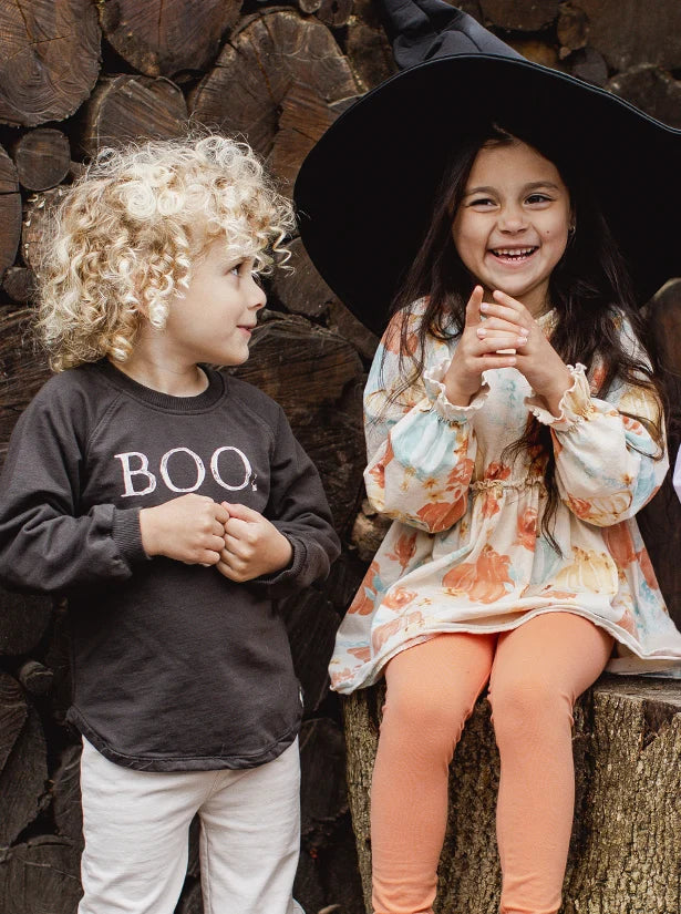 Children wearing new fall outfits